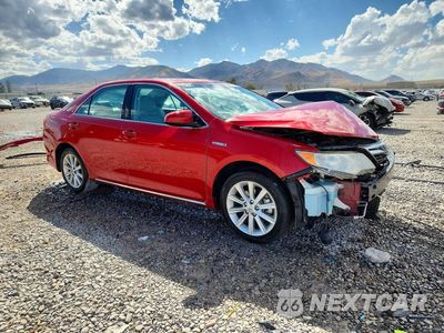 Czwarte zdjęcie samochodu z boku: 2014 TOYOTA CAMRY HYBRID XLE VIN:4T1BD1FK0EU103684 - miniatura