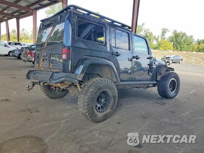 Trzecie zdjęcie samochodu z tyłu: 2012 JEEP WRANGLER UNLIMITED RUBICON VIN:1C4BJWFG4CL215607 - miniatura