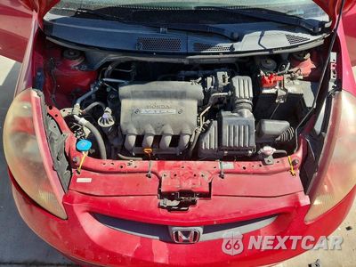 Zdjęcie 11 z 13 samochodu: 2007 HONDA FIT S VIN:JHMGD38697S024002 - miniatura