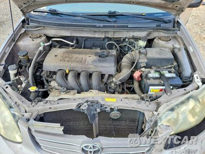 Zdjęcie 11 z 12 samochodu: 2003 TOYOTA COROLLA CE VIN:1NXBR32E53Z013456 - miniatura