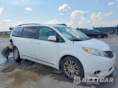 Czwarte zdjęcie samochodu z boku: 2014 TOYOTA SIENNA XLE 8-PASSENGER VIN:5TDYK3DC5ES438780 - miniatura