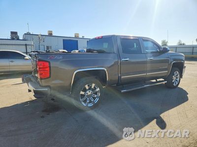Trzecie zdjęcie samochodu z tyłu: 2014 CHEVROLET SILVERADO K1500 LT VIN:3GCUKREC8EG297217 - miniatura