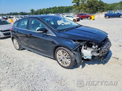 Czwarte zdjęcie samochodu z boku: 2017 FORD FOCUS TITANIUM VIN:1FADP3N27HL330856 - miniatura