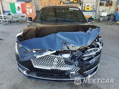 Piąte zdjęcie samochodu w środku: 2017 LINCOLN MKZ RESERVE VIN:3LN6L5E90HR619842 - miniatura