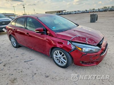 Czwarte zdjęcie samochodu z boku: 2017 FORD FOCUS SE VIN:1FADP3F23HL347667 - miniatura