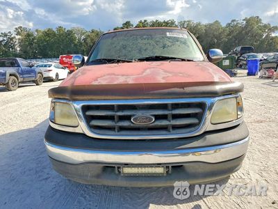 Piąte zdjęcie samochodu w środku: 2000 FORD F150 VIN:1FTRX17W3YNB02944 - miniatura