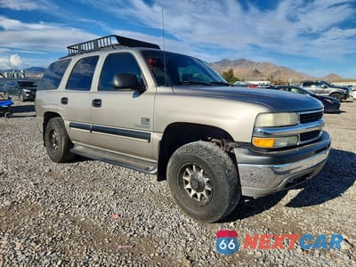Czwarte zdjęcie samochodu z boku: 2001 CHEVROLET TAHOE K1500 VIN:1GNEK13T31R201746 - miniatura