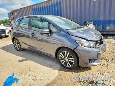 Czwarte zdjęcie samochodu z boku: 2015 HONDA FIT EX VIN:3HGGK5H82FM733724 - miniatura