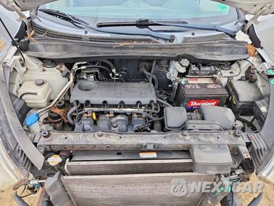 Zdjęcie 12 z 14 samochodu: 2010 HYUNDAI TUCSON GLS VIN:KM8JT3AC8AU061656 - miniatura