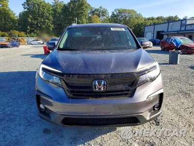 Piąte zdjęcie samochodu w środku: 2022 HONDA PILOT SE VIN:5FNYF6H20NB099664 - miniatura