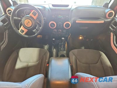 Zdjęcie 8 z 13 samochodu: 2013 JEEP WRANGLER UNLIMITED SAHARA VIN:1C4BJWEG1DL597260 - miniatura