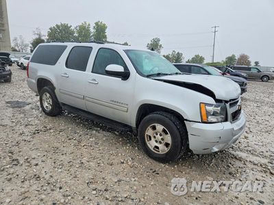 Czwarte zdjęcie samochodu z boku: 2014 CHEVROLET SUBURBAN K1500 LT VIN:1GNSKJE74ER148483 - miniatura