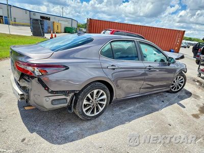 Trzecie zdjęcie samochodu z tyłu: 2022 TOYOTA CAMRY LE VIN:4T1C11AK0NU646652 - miniatura