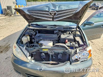 Zdjęcie 11 z 12 samochodu: 2004 TOYOTA CAMRY LE VIN:4T1BE32KX4U341281 - miniatura