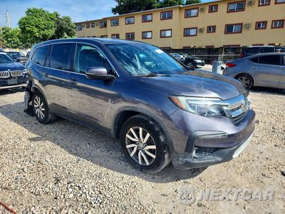 Czwarte zdjęcie samochodu z boku: 2020 HONDA PILOT EXL VIN:5FNYF5H52LB017192 - miniatura