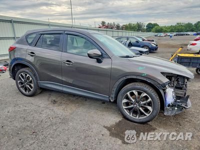 Czwarte zdjęcie samochodu z boku: 2016 MAZDA CX-5 GT VIN:JM3KE4DY0G0876196 - miniatura
