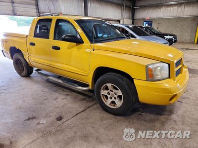 Czwarte zdjęcie samochodu z boku: 2006 DODGE DAKOTA QUAD SLT VIN:1D7HE48J56S558793 - miniatura