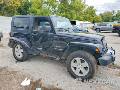 Czwarte zdjęcie samochodu z boku: 2008 JEEP WRANGLER SAHARA VIN:1J8FA54168L532329 - miniatura