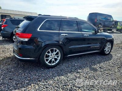 Trzecie zdjęcie samochodu z tyłu: 2014 JEEP GRAND CHEROKEE SUMMIT VIN:1C4RJFJG6EC527419 - miniatura