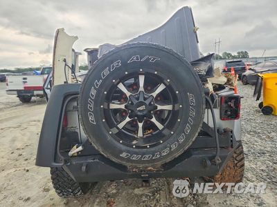 Zdjęcie 6 z 13 samochodu: 2013 JEEP WRANGLER UNLIMITED SAHARA VIN:1C4BJWEG3DL648970 - miniatura