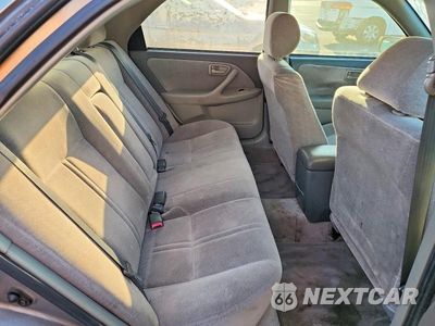 Zdjęcie 10 z 12 samochodu: 1999 TOYOTA CAMRY LE VIN:JT2BG28K9X0282678 - miniatura