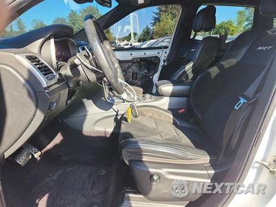 Zdjęcie 7 z 14 samochodu: 2016 JEEP GRAND CHEROKEE SRT-8 VIN:1C4RJFDJ8GC326406 - miniatura