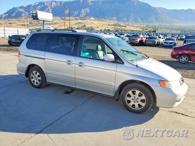 Czwarte zdjęcie samochodu z boku: 2004 HONDA ODYSSEY EXL VIN:5FNRL18084B106888 - miniatura