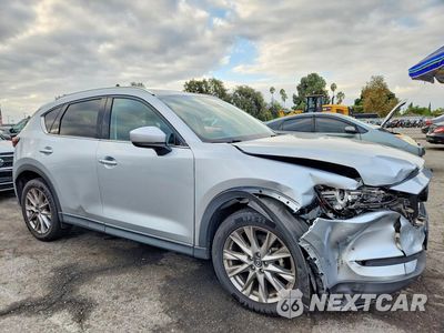 Czwarte zdjęcie samochodu z boku: 2021 MAZDA CX-5 GRAND TOURING VIN:JM3KFADM1M0374267 - miniatura