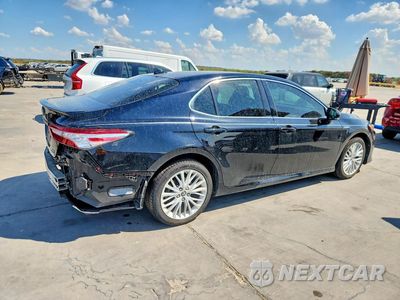 Trzecie zdjęcie samochodu z tyłu: 2019 TOYOTA CAMRY HYBRID XLE VIN:4T1B21HK4KU011332 - miniatura