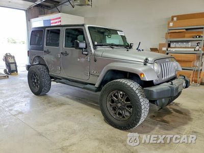 Czwarte zdjęcie samochodu z boku: 2018 JEEP WRANGLER UNLIMITED SAHARA VIN:1C4HJWEG2JL840127 - miniatura