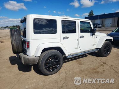 Trzecie zdjęcie samochodu z tyłu: 2011 JEEP WRANGLER UNLIMITED SAHARA VIN:1J4HA5H14BL575952 - miniatura