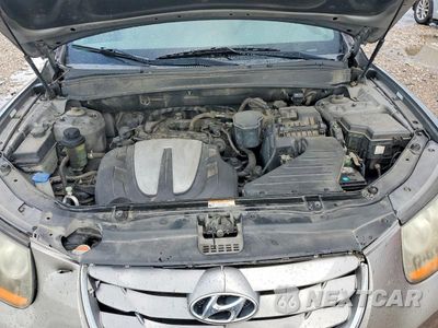 Zdjęcie 12 z 13 samochodu: 2011 HYUNDAI SANTA FE SE VIN:5XYZH4AG1BG046629 - miniatura