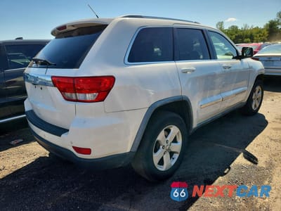 Trzecie zdjęcie samochodu z tyłu: 2011 JEEP GRAND CHEROKEE LAREDO VIN:1J4RR4GG2BC714716 - miniatura