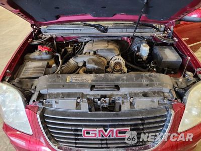 Zdjęcie 12 z 13 samochodu: 2011 GMC YUKON XL SLT VIN:1GKS2KE30BR172520 - miniatura