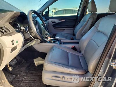 Zdjęcie 7 z 14 samochodu: 2017 HONDA PILOT EXL VIN:5FNYF5H56HB025304 - miniatura