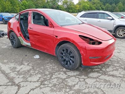 Czwarte zdjęcie samochodu z boku: 2023 TESLA MODEL Y VIN:7SAYGDEE3PA098642 - miniatura