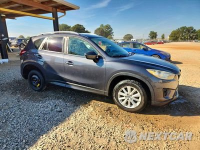 Czwarte zdjęcie samochodu z boku: 2014 MAZDA CX-5 TOURING VIN:JM3KE2CY8E0344505 - miniatura