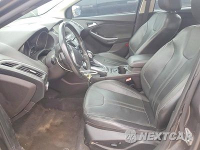 Zdjęcie 7 z 12 samochodu: 2013 FORD FOCUS TITANIUM VIN:1FADP3J29DL326744 - miniatura