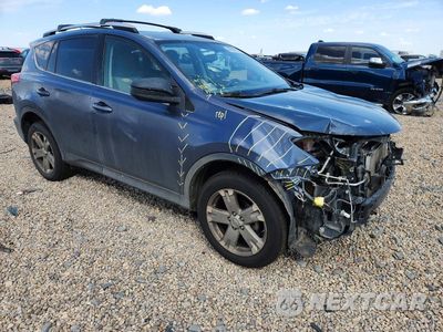 Czwarte zdjęcie samochodu z boku: 2014 TOYOTA RAV4 LE VIN:JTMZFREV7ED037447 - miniatura
