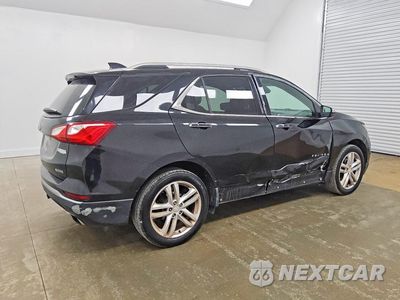 Trzecie zdjęcie samochodu z tyłu: 2018 CHEVROLET EQUINOX PREMIER VIN:3GNAXNEXXJL289015 - miniatura