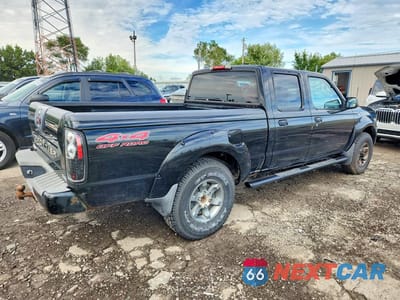 Trzecie zdjęcie samochodu z tyłu: 2004 NISSAN FRONTIER XE-V6 VIN:1N6ED29Y34C404958 - miniatura