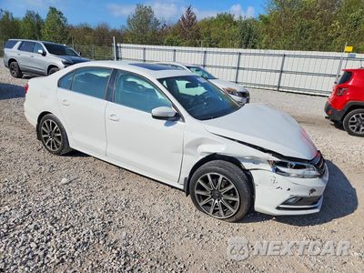 Czwarte zdjęcie samochodu z boku: 2015 VOLKSWAGEN JETTA SE VIN:3VWD17AJ2FM252673 - miniatura