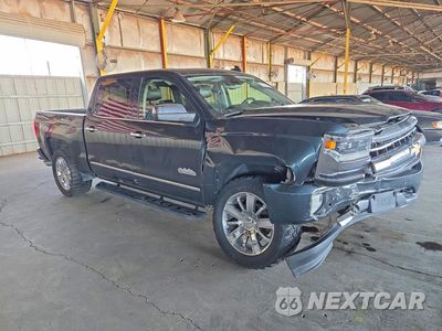 Czwarte zdjęcie samochodu z boku: 2017 CHEVROLET SILVERADO K1500 HIGH COUNTRY VIN:3GCUKTEJ4HG279801 - miniatura
