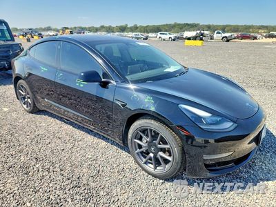 Czwarte zdjęcie samochodu z boku: 2021 TESLA MODEL 3 VIN:5YJ3E1EB2MF978800 - miniatura