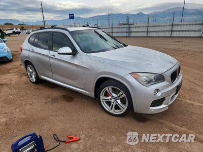 Czwarte zdjęcie samochodu z boku: 2014 BMW X1 XDRIVE28I VIN:WBAVL1C50EVY13775 - miniatura