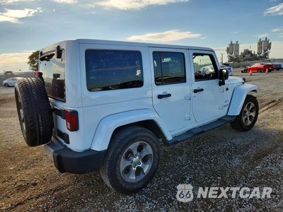 Trzecie zdjęcie samochodu z tyłu: 2017 JEEP WRANGLER UNLIMITED SAHARA VIN:1C4HJWEG8HL595490 - miniatura