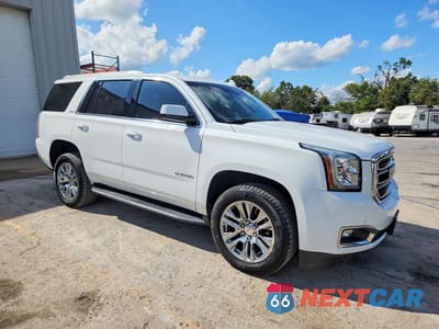 Czwarte zdjęcie samochodu z boku: 2017 GMC YUKON SLE VIN:1GKS2AKC6HR234638 - miniatura