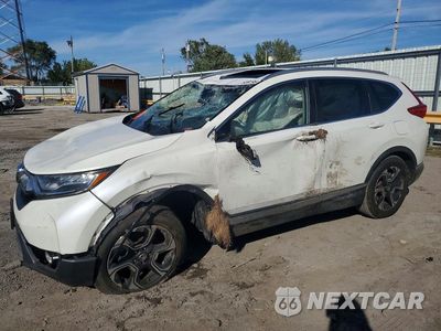 2017 HONDA CR-V TOURING 5J6RW2H97HL018326 - główne zdjęcie licytacji z USA - miniatura