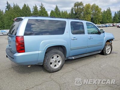 Trzecie zdjęcie samochodu z tyłu: 2011 CHEVROLET SUBURBAN K1500 LT VIN:1GNSKJE34BR292656 - miniatura