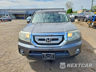 Piąte zdjęcie samochodu w środku: 2011 HONDA PILOT EXLN VIN:5FNYF4H79BB094104 - miniatura